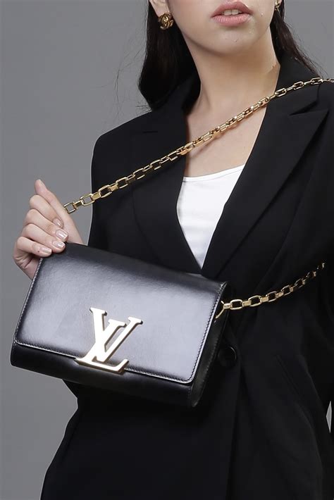 louis vuitton black purse gold chain|Louis Vuitton black small purse.